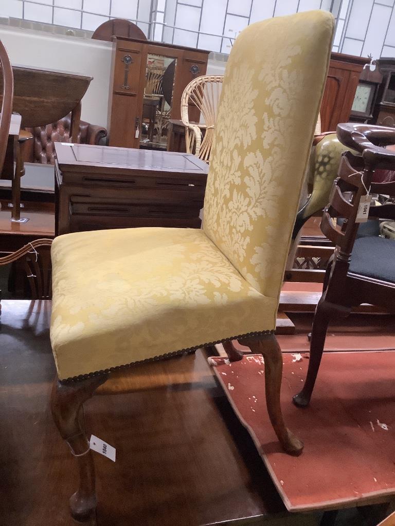 A mid 18th century walnut hall chair, width 60cm